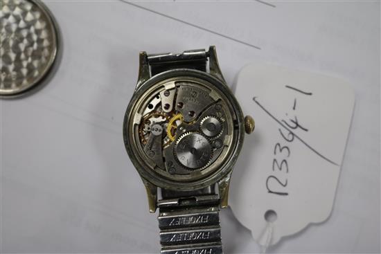 A gentlemans stainless steel Vertex military manual wind wrist watch.